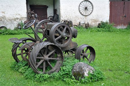 simsearch:400-08427564,k - Very old tractor with wheels from iron Photographie de stock - Aubaine LD & Abonnement, Code: 400-04910341