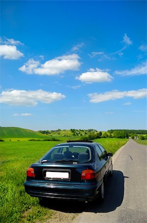 simsearch:400-04552473,k - Car is parked in road side with a beautiful landscape. Stock Photo - Budget Royalty-Free & Subscription, Code: 400-04910532