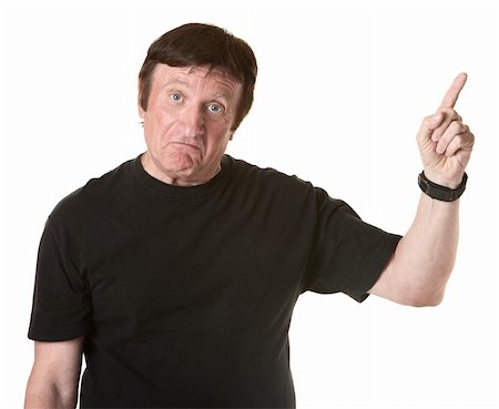 Mature Caucasian male on white background points index finger upward Foto de stock - Super Valor sin royalties y Suscripción, Código: 400-04910563