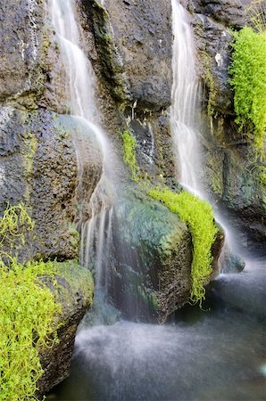 water falling over lava rocks in Hawaii. Stock Photo - Budget Royalty-Free & Subscription, Code: 400-04910769
