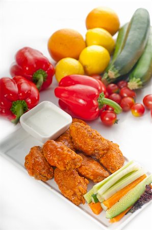 simsearch:400-07312643,k - classic  buffalo chicken wings served with fresh pinzimonio and vegetables on background,MORE DELICIOUS FOOD ON PORTFOLIO Stockbilder - Microstock & Abonnement, Bildnummer: 400-04911123