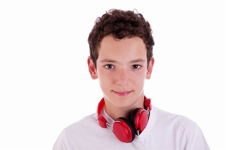 young man standing listening to music on red headphones, isolated on white, studio shot Stock Photo - Budget Royalty-Free & Subscription, Code: 400-04911156