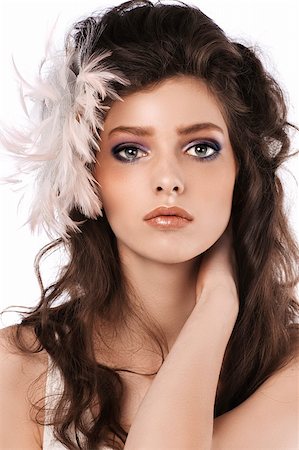 simsearch:400-06103705,k - fashion close up of a brunette with long curled hair and pink feather accessory Foto de stock - Super Valor sin royalties y Suscripción, Código: 400-04911165