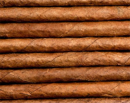 Cigars in a row close-up Stock Photo - Budget Royalty-Free & Subscription, Code: 400-04911350