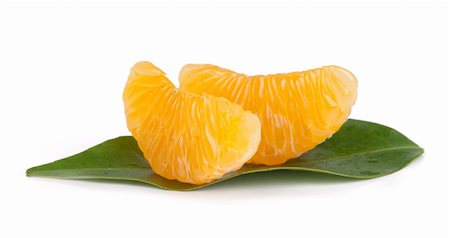 simsearch:400-07613620,k - Mandarin citrus fruit slices isolated on white Stockbilder - Microstock & Abonnement, Bildnummer: 400-04911390