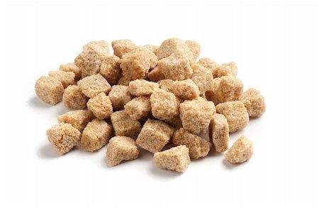 simsearch:400-04823249,k - cane sugar cubes isolated on a white background Stock Photo - Budget Royalty-Free & Subscription, Code: 400-04911405