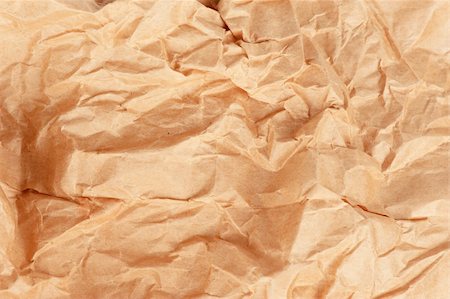 scrolled up paper - crumpled brown paper, abstract background Stock Photo - Budget Royalty-Free & Subscription, Code: 400-04911475