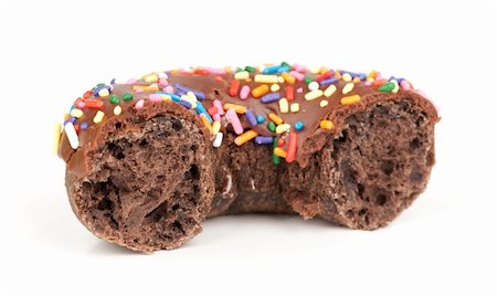 doughnut diet - chocolate doughnut isolated on white background Stock Photo - Budget Royalty-Free & Subscription, Code: 400-04911473