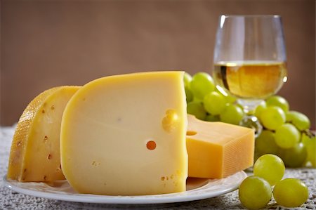 foodphoto (artist) - Emmental cheese and glass of wine Photographie de stock - Aubaine LD & Abonnement, Code: 400-04912523