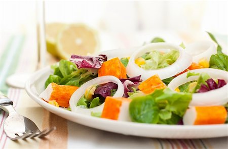 surimi salad with fresh corn on white dish Stock Photo - Budget Royalty-Free & Subscription, Code: 400-04913799