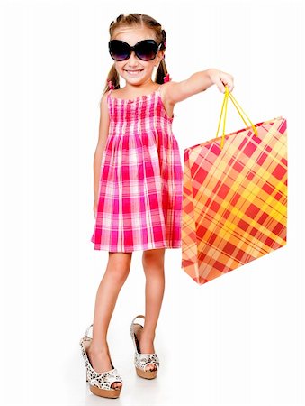 little girl with the package isolated on a white background Stock Photo - Budget Royalty-Free & Subscription, Code: 400-04913823