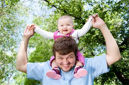 father playing with baby, baby sitting on father Stock Photo - Budget Royalty-Free & Subscription, Code: 400-04913959