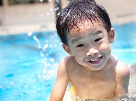 simsearch:400-04731600,k - happy Boy in Swimming Pool Stock Photo - Budget Royalty-Free & Subscription, Code: 400-04913951