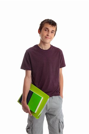 A male student carrying books and folder.  White background. Stock Photo - Budget Royalty-Free & Subscription, Code: 400-04924124