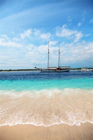 Luxury boat on a stunning beach in Gili Trawangan, Indonesia Stock Photo - Budget Royalty-Free & Subscription, Code: 400-04924166