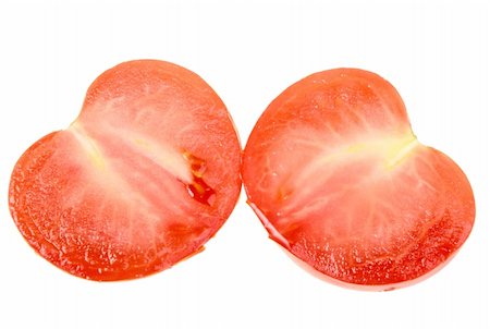 Two cross of a ripe red tomato as heart-form. Isolated on white background. Close-up. Studio photography. Stock Photo - Budget Royalty-Free & Subscription, Code: 400-04924234