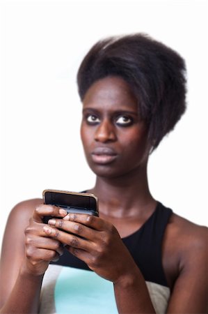 simsearch:400-05321860,k - Beautiful Black Woman Typing on Mobile Phone Foto de stock - Super Valor sin royalties y Suscripción, Código: 400-04924273