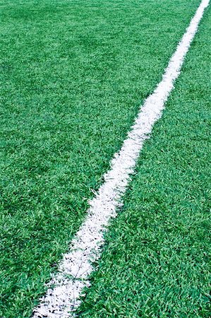 simsearch:400-05133000,k - Fake grass soccer field with line Fotografie stock - Microstock e Abbonamento, Codice: 400-04924284