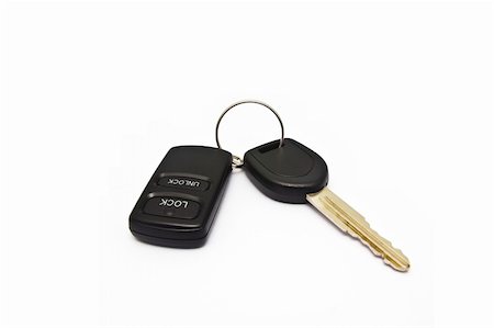 simsearch:400-07445673,k - Car key and Remore on white background. Photographie de stock - Aubaine LD & Abonnement, Code: 400-04924303