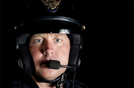 first responder - a police motorcycle officer in the night. Stock Photo - Budget Royalty-Free & Subscription, Code: 400-04924354