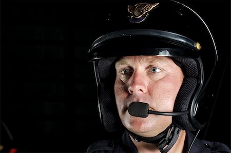 first responder - a police motorcycle officer in the night. Stock Photo - Budget Royalty-Free & Subscription, Code: 400-04924355