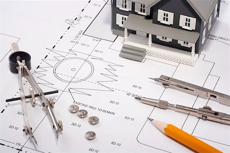 diagrammatic drawing in architecture - House model and drafting tools on a construction plan. Stock Photo - Budget Royalty-Free & Subscription, Code: 400-04925075