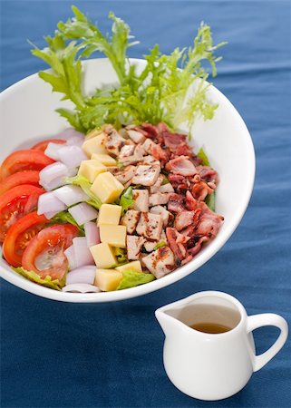 simsearch:400-08573799,k - fresh classic caesar salad  over blue tablecloth close up,healthy meal Stockbilder - Microstock & Abonnement, Bildnummer: 400-04925328