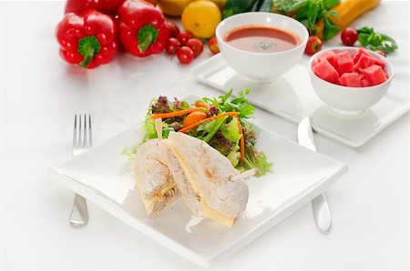 tuna fish and cheese sandwich with fresh mixed salad ,watermelon and gazpacho soup on side,with fresh vegetables on background Stock Photo - Budget Royalty-Free & Subscription, Code: 400-04925343