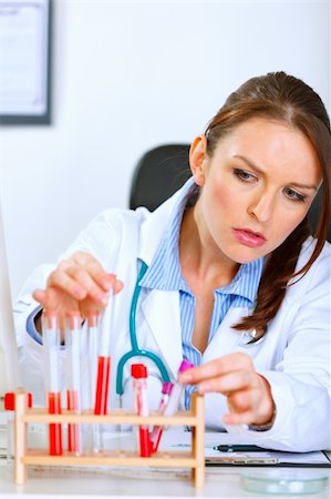 simsearch:400-07099889,k - Doctor woman working with tubes in laboratory Stock Photo - Budget Royalty-Free & Subscription, Code: 400-04925811