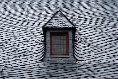 Slate roof with attic. Traditional Harx building from Wernigerode, Germany. Foto de stock - Royalty-Free Super Valor e Assinatura, Número: 400-04926208
