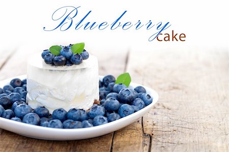 simsearch:400-06698338,k - Cheesecake with fresh blueberries on wooden table, rustic style, place for your text up Stock Photo - Budget Royalty-Free & Subscription, Code: 400-04920256
