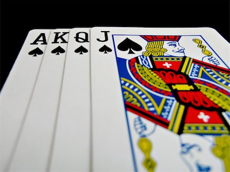 simsearch:400-03949924,k - spade straight flush isolated on black background Stock Photo - Budget Royalty-Free & Subscription, Code: 400-04920388