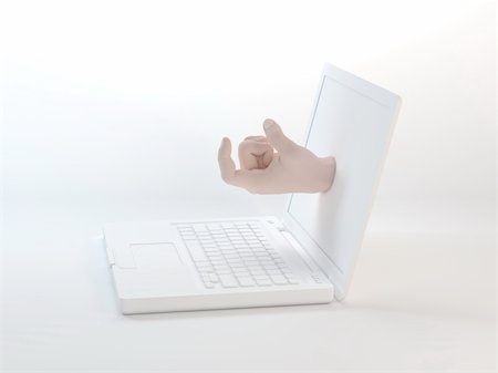 sniperz (artist) - A hand gesturing from laptop Foto de stock - Royalty-Free Super Valor e Assinatura, Número: 400-04920743