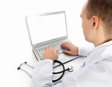 doctor business computer - Rear view of a young doctor with laptop Stock Photo - Budget Royalty-Free & Subscription, Code: 400-04921036