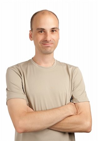 simsearch:400-05745952,k - Smiling young casual man looking at camera Stock Photo - Budget Royalty-Free & Subscription, Code: 400-04921050