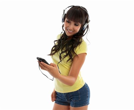 simsearch:400-03915719,k - An attractive young woman enjoying her music player. Foto de stock - Royalty-Free Super Valor e Assinatura, Número: 400-04921400