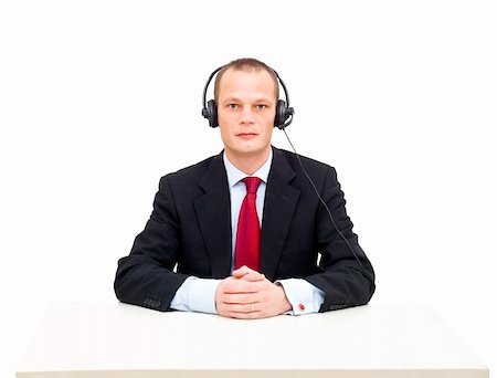 A businessman with a headset and microphone ready to take your call Photographie de stock - Aubaine LD & Abonnement, Code: 400-04922082