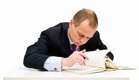 suit sweat - A businessman sweating over technical literature, expanding his knowledge through further studies Stock Photo - Budget Royalty-Free & Subscription, Code: 400-04922093