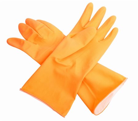 Two orange rubber gloves. Close-up. Isolated on white background. Studio photography. Stock Photo - Budget Royalty-Free & Subscription, Code: 400-04922352