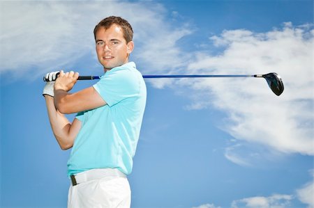 simsearch:400-04942072,k - An image of a young male golf player Foto de stock - Royalty-Free Super Valor e Assinatura, Número: 400-04922487