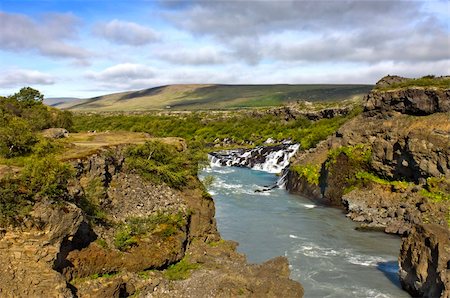 simsearch:400-04923181,k - The spectacular Hraunfossar cascades in Iceland Photographie de stock - Aubaine LD & Abonnement, Code: 400-04923181