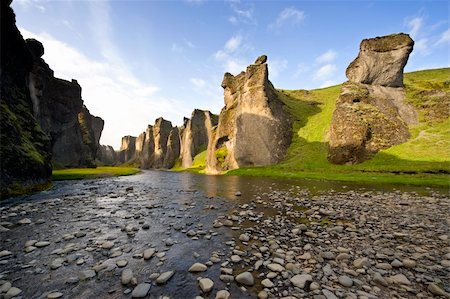 simsearch:400-04923181,k - An ancient Canyon in Hunkarbakkar, Iceland, where the different layers of volcanic branch pipes have created hard structures, which still stand erect, when over time, the softer ashes and eruption debris has been eroded away, forming the erratic banks of the canyon Photographie de stock - Aubaine LD & Abonnement, Code: 400-04923182