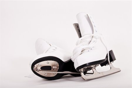 simsearch:400-04797181,k - Pair of women figure skates isolated on white background Stock Photo - Budget Royalty-Free & Subscription, Code: 400-04923676