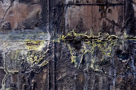 rusting tank - The corroded grungy structures of an industrial waste water tank, showing the crystallinisation of the various minerals, such as the yellow sulphur - Also very useful as grunge background Stock Photo - Budget Royalty-Free & Subscription, Code: 400-04923823