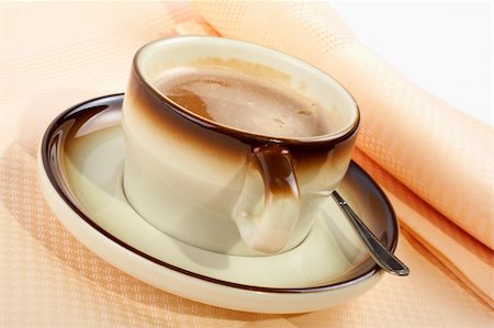 simsearch:400-05005441,k - Close-up of a cup of coffee with the spoon, on ceramic plate Stock Photo - Budget Royalty-Free & Subscription, Code: 400-04934006
