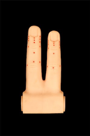 acupuncture points on fingers isolated on black background Fotografie stock - Microstock e Abbonamento, Codice: 400-04934081