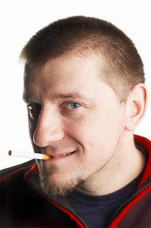 simsearch:400-05005666,k - casual short haired young man posing with cigarette Foto de stock - Super Valor sin royalties y Suscripción, Código: 400-04934551