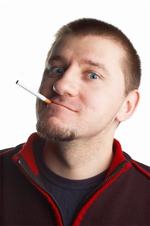 simsearch:400-05005666,k - casual short haired young man posing with cigarette Foto de stock - Super Valor sin royalties y Suscripción, Código: 400-04934553