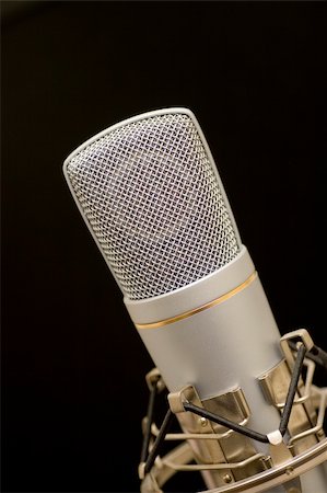 elvis stage - song microphone on black background Stock Photo - Budget Royalty-Free & Subscription, Code: 400-04934711