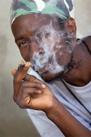 rastafarian - Rastafarian man smoking cannabis Stock Photo - Budget Royalty-Free & Subscription, Code: 400-04934805
